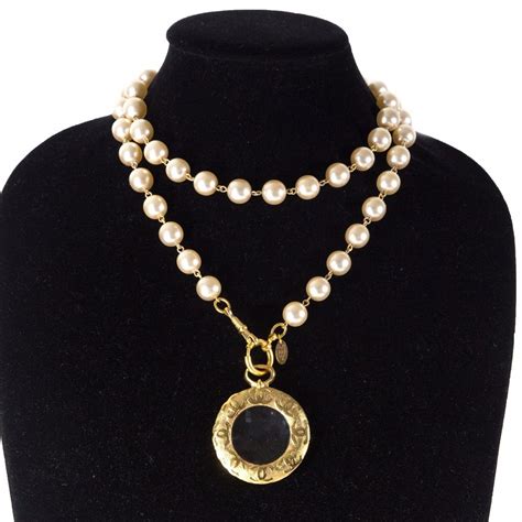 chanel long pearl logo necklace